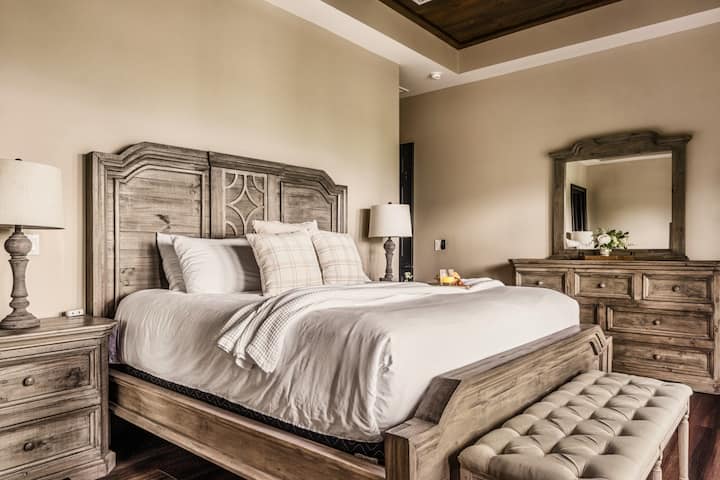 Upper level king bedroom with en-suite bathroom, private deck, TV and luxury linens!