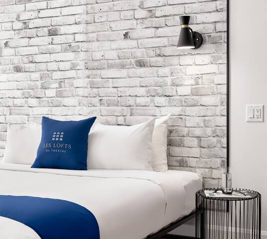 Les Lofts Du Théâtre managed Airbnb listing 2