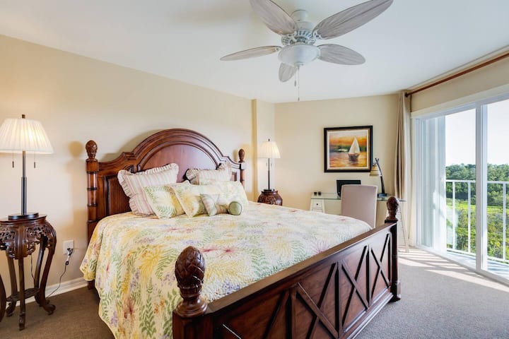 Master King bedroom with ensuite bath and private balcony and desk!