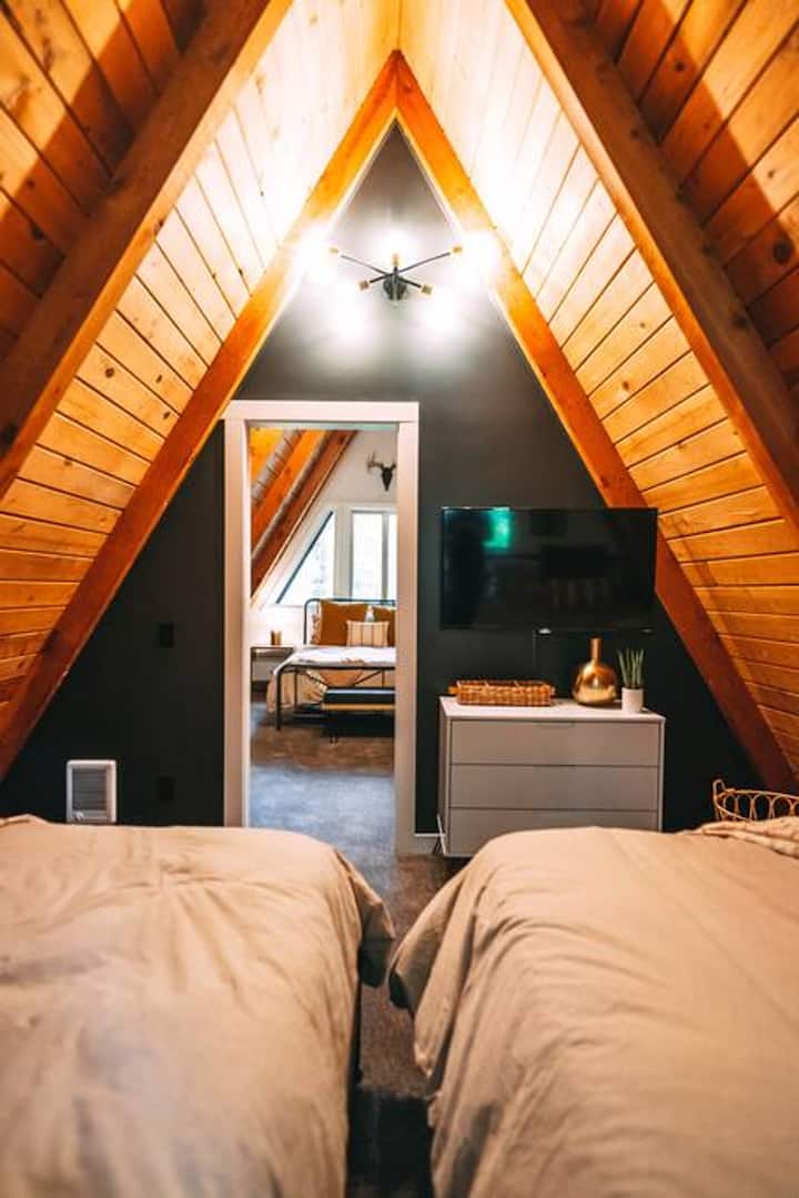 Second bedroom featuring 2 queen beds and smart TV