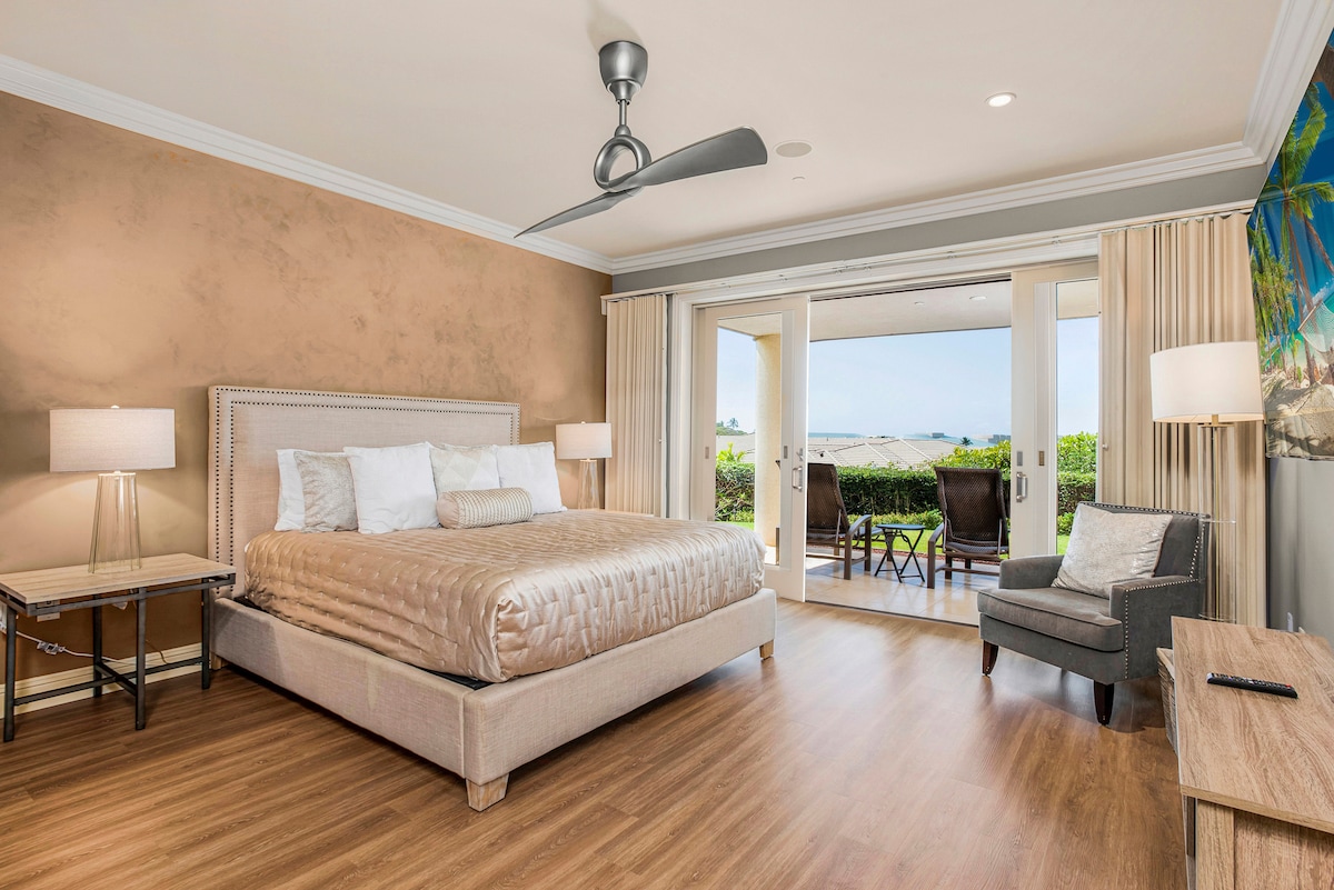 优雅的主卧室，可欣赏海景，还有一个步出式露台。