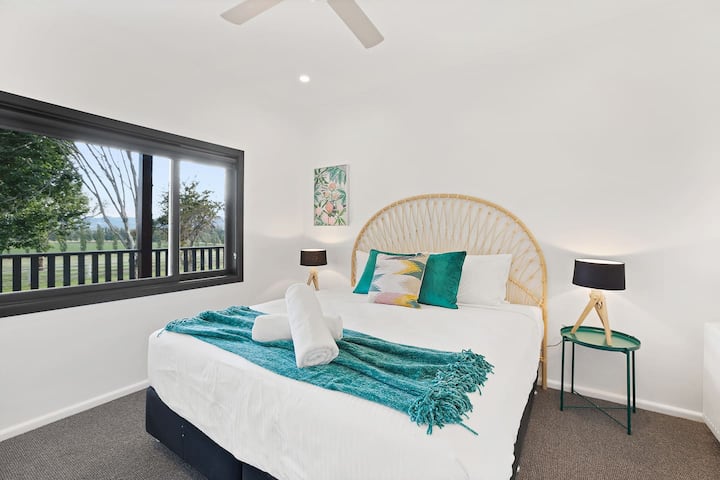 A fourth king bedroom also enjoys garden views, black-out blinds, and a ceiling fan.