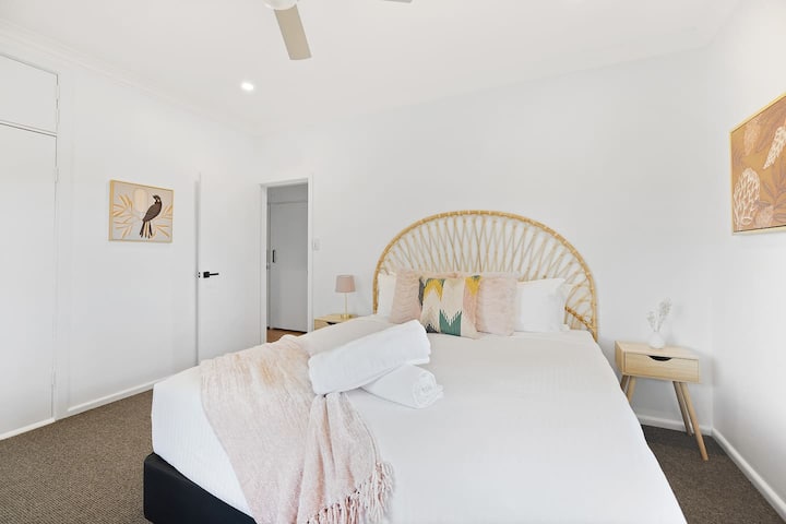 A coastal-inspired second bedroom also comes with a plush king bed dressed in hotel-quality linens and an ensuite.