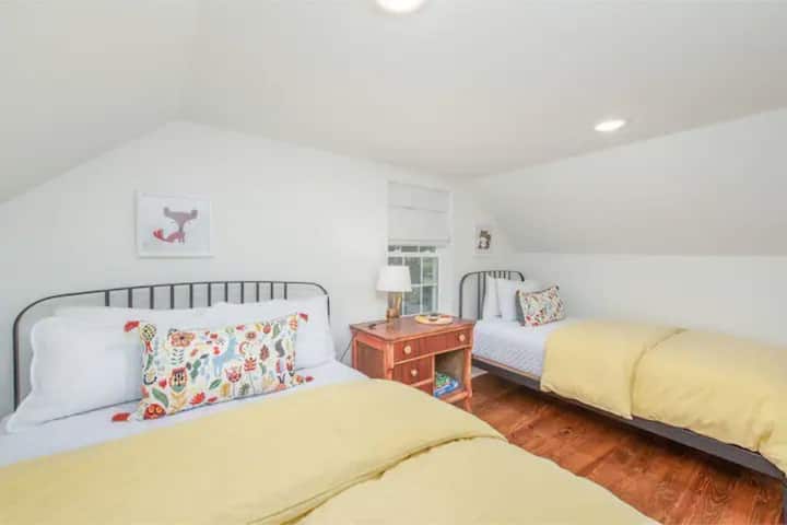 Bedroom 4, second floor. Full and twin size beds. Door opens into loft area hall.