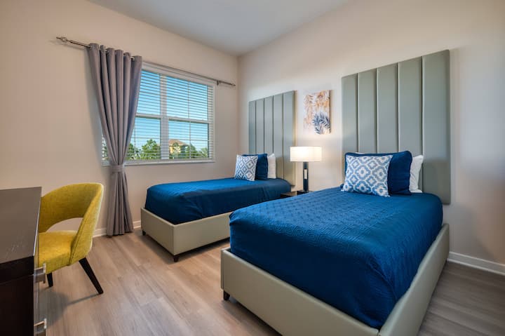 Dormitorio con dos camas matrimoniales