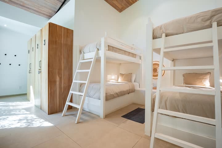 Twin XL Bunk Room: Fun bunk room with four Twin XL beds, ensuite bath, and closet—ideal for kids or friends.