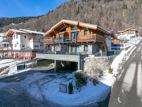 Ski-in/ski-out luxury lodge with balcony terrace
