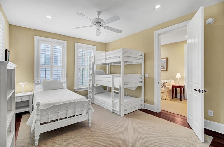 Bedroom 6 features a twin bed & triple bunk bed.
