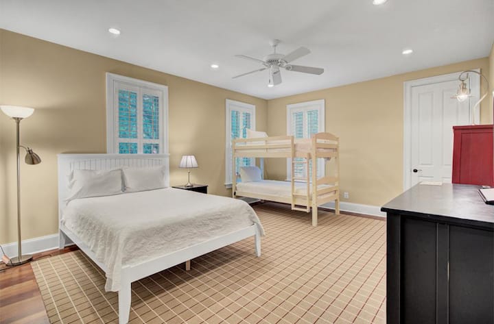 Bedroom 4 features a queen bed & bunk bed.