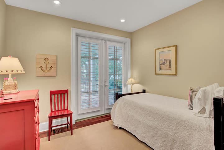 Bedroom 2 features a twin bed and trundle.