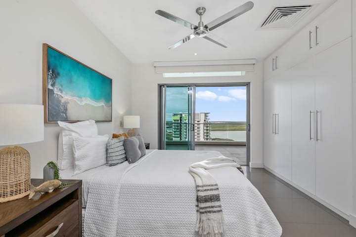 Third bedroom with Queen bed, ensuite bathroom, built-in wardrobes and glass doors out onto balcony.
