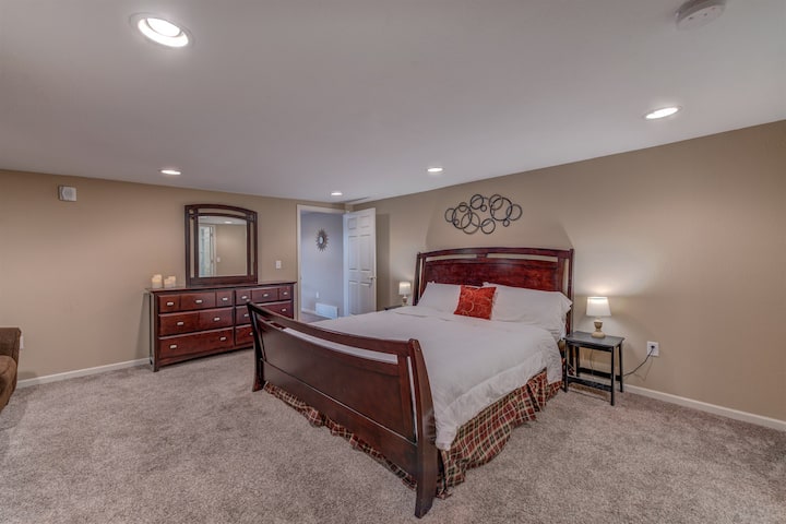 The master bedroom holds a king-sized bed and soft electronic candles to wind down after a long day of vacation fun.