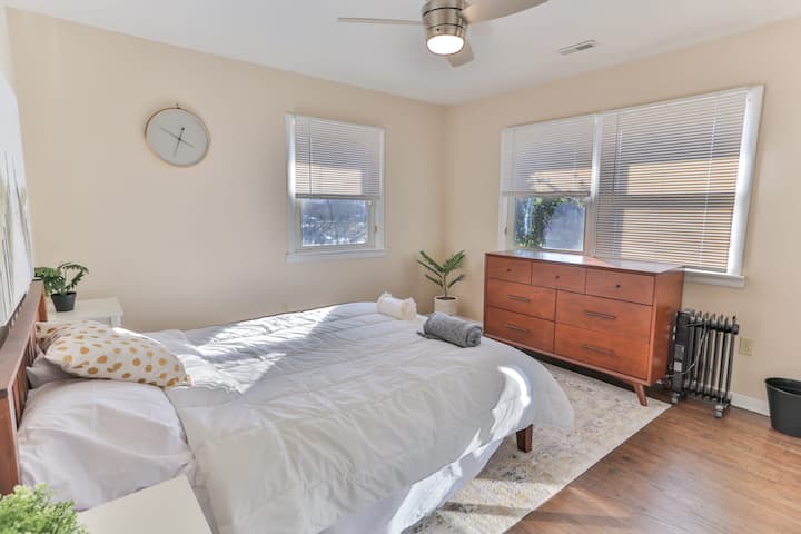 Bedroom #2 features a queen-sized bed, a dresser, a large closet, and a ceiling fan.