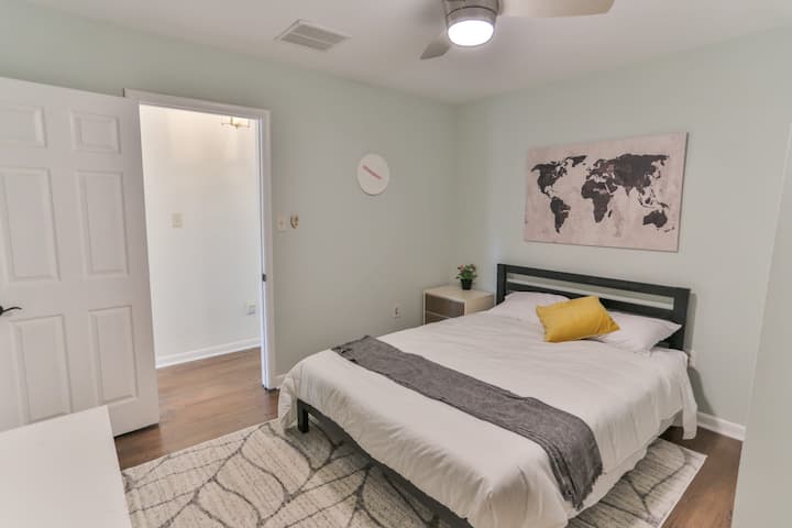 Bedroom #3 features a queen-sized bed, a dresser, a large closet, and a ceiling fan.
