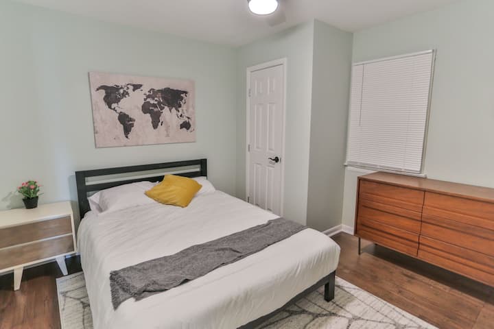 Bedroom #3 features a queen-sized bed, a dresser, a large closet, and a ceiling fan.