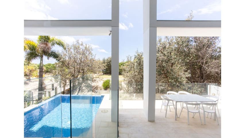 Paralian- Beachfront Home with Sauna