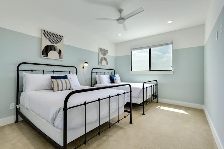 Bedroom 4, second level- This guest room boasts 2 queen size beds