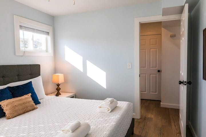 Master bedroom located on the main level beside the living room and full bathroom