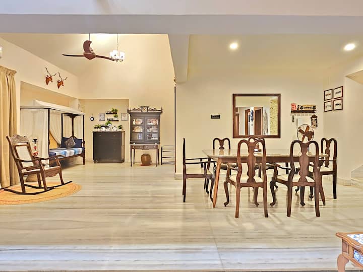 Elegant Villa Dining Beneath Grand Double Heights