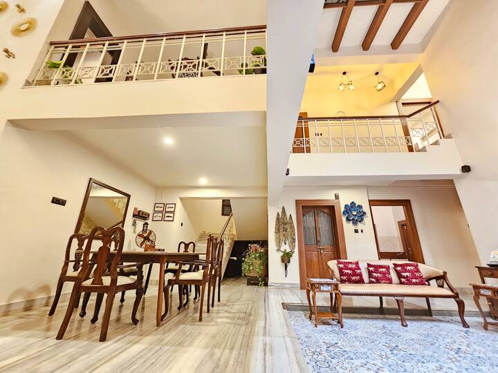 Elegant Double-Height Dining Lounge | Goa Escape