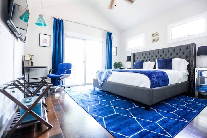 The Blue Suite has access to the sun deck and includes a desk for all your work-from-home needs.