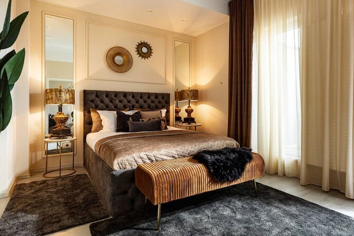 Indulge in comfort in our dual luxury bedrooms, each featuring plush, king-sized beds.