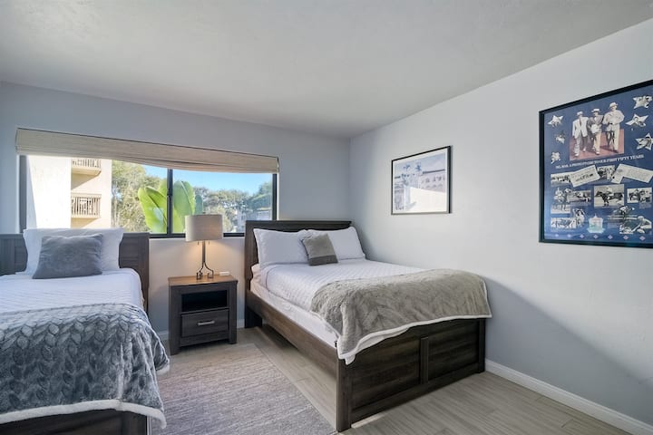 Second bedroom sleeps three with a full sized bed and a twin bed.