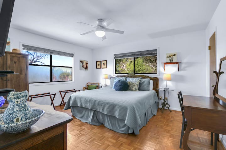 The first bedroom has a king size bed