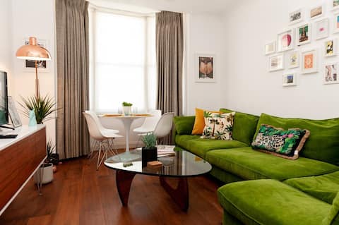 Stylish Seaside Apartment with Sun-Trap Patio