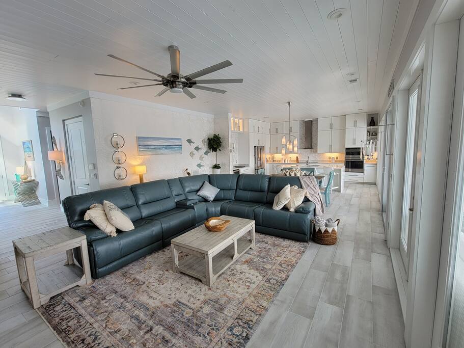 Large living area that views the outdoor pool/patio area.