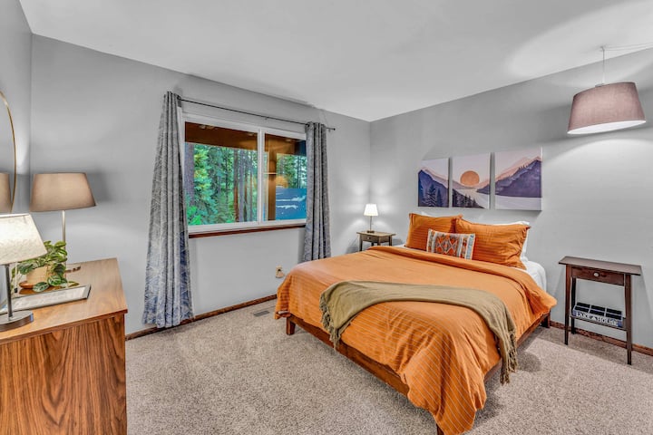 Bedroom 2: Queen bed, dresser, closet, lower floor