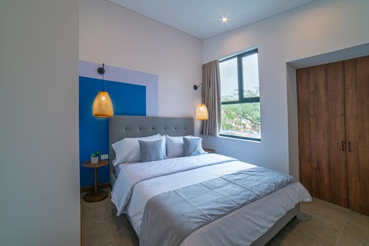 Bedroom 3 on second floor with A/C, blackout curtains, and SmartTV.