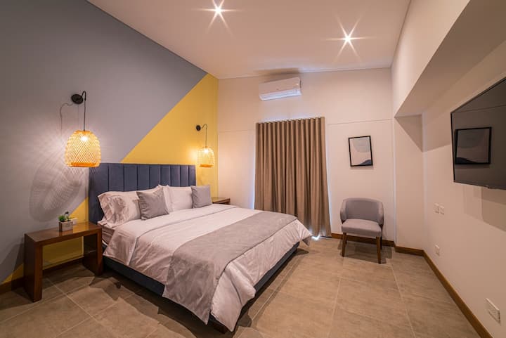 Bedroom 2 with curtains closed.