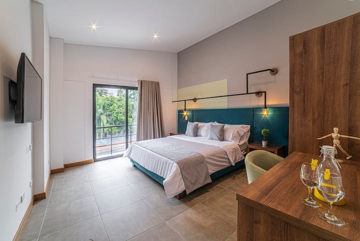 Master bedroom with noise reducing windows and a view of park across the street.