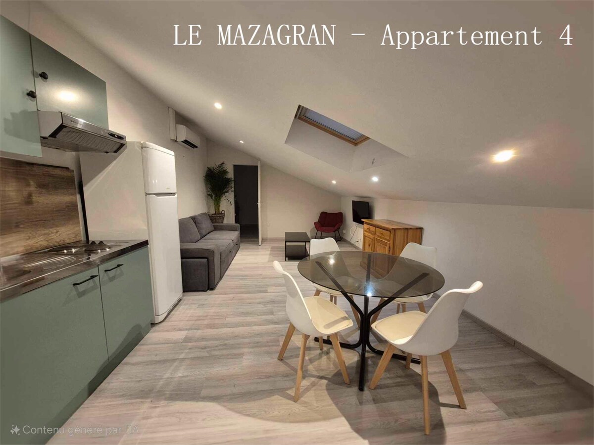 A modern living space is featured, showcasing a light-filled area with a sloped ceiling. A dining table with four chairs is positioned near large windows, while a comfortable sofa and kitchenette are visible in the background, creating an open and inviting atmosphere.