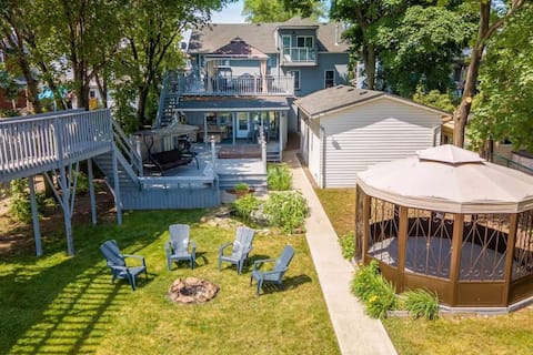 Lakefront Haven: 6BR Cottage with Hot Tub & Views