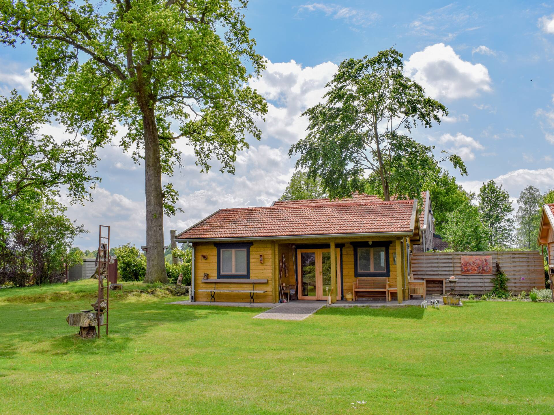 Romantic wooden cottage with lots of art