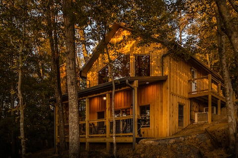 Private cabin on river with scenic mountain views