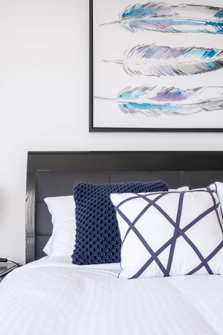 Bedroom two has a plush king sized bed and stunning ocean views.