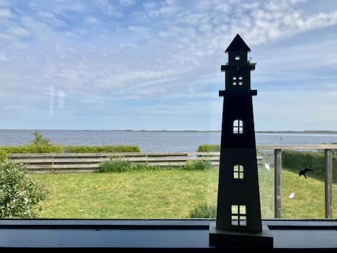 Successful Airbnb property: 6 pers Holiday home Aurora with directly on the La in Anjum Noordoost