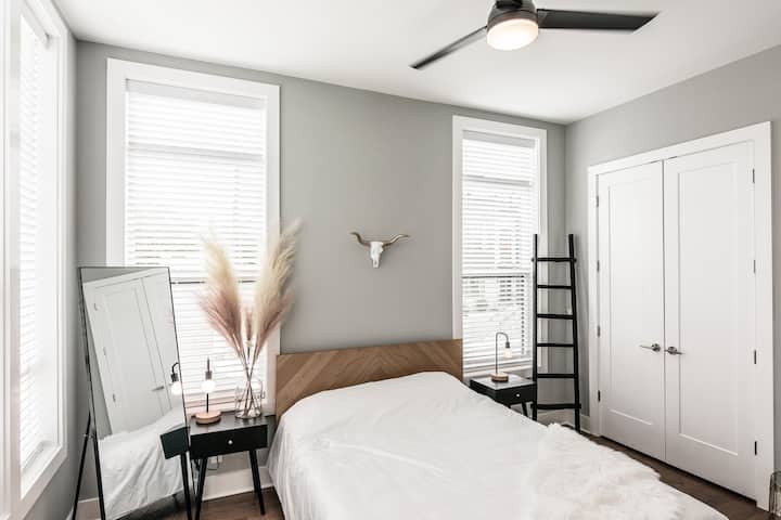 Bright natural lighting and a full length mirror are just a few perks of this room selection.