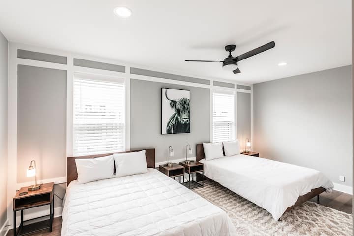 Double up in this bedroom furnished with 2 plush queen size beds.