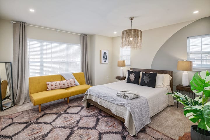 Front bedroom has a queen bed and futon and connects to a full bathroom