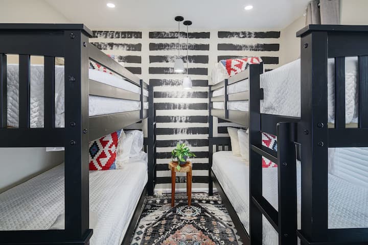 Middle bedroom features 4 twin size memory foam beds