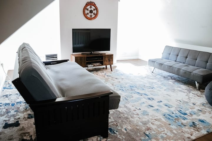 UPSTAIRS: The bonus room is a perfect place for kids to hang out, play games, or watch TV.
