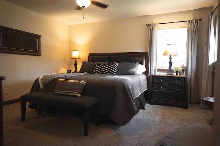 Primary bedroom with a king size bed