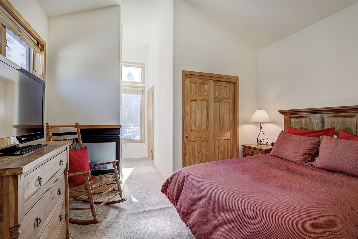 Bedroom 2 with en-suite bathroom & fireplace.
