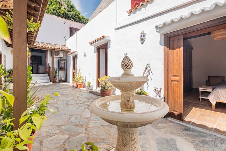 Stone fountain in the central courtyard of the traditional Canarian house