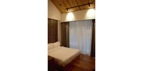 Moksha Riverside-Deluxe Double Bedroom With Balcony