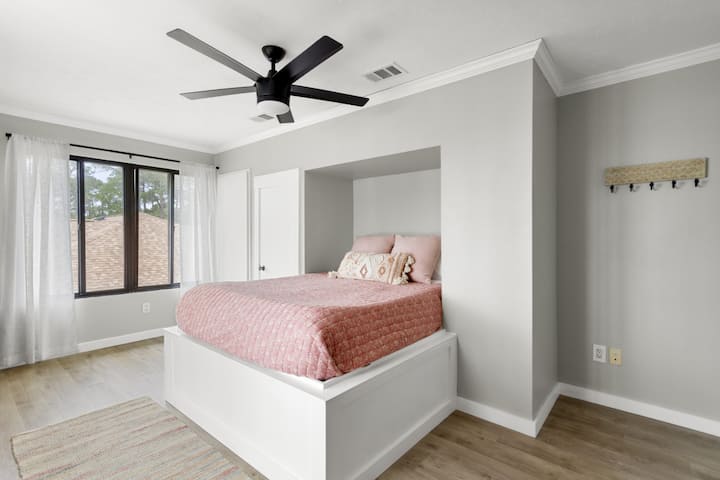 Upstairs bedroom with queen bed. 